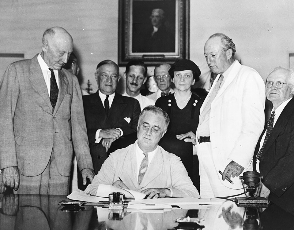 The Social Security Act of 1935 establishing social security and unemployment insurance
